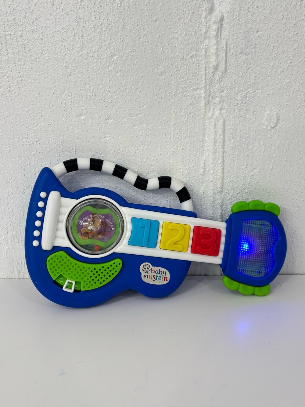 Baby Einstein Rock, Light & Roll Guitar
WORKS